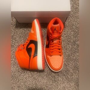 Nike Air Jordan 1 Mid in Rush Orange and Black. Size 8.